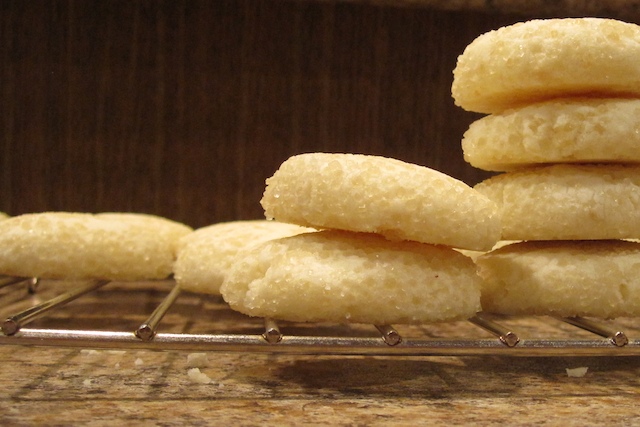Golden shortbread biscuits cooling on a wire rack